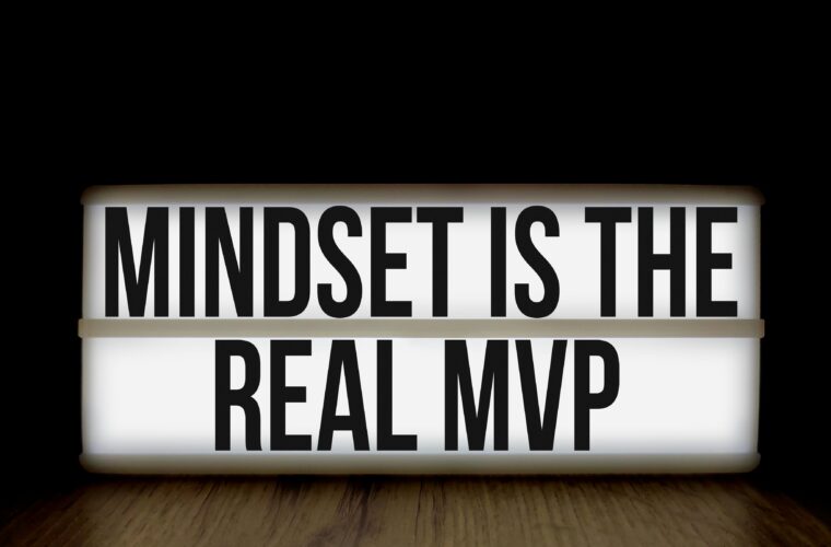 Motivational message 'Mindset is the Real MVP' displayed on a lightbox with black background.
